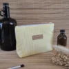 Trousse triangle à rayures jaunes sur le site Johanna Créations