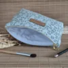 Trousse triangle graou vert 3 Trousse triangle à motifs léopard ou graou vert avec vu intérieur sur le site Johanna Créations
